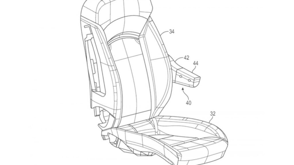GM придумала подлокотник-столик для ноутбука и еды в автомобилях