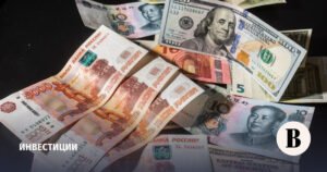 Рубль рекордно упал к доллару и юаню